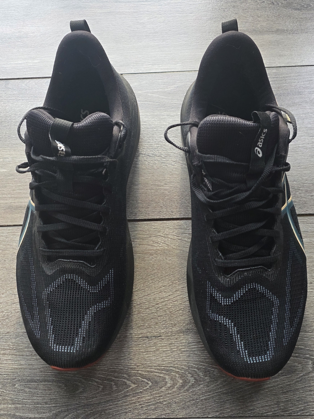 ASICS Black Athletic Running Shoes with Teal and Red Accents